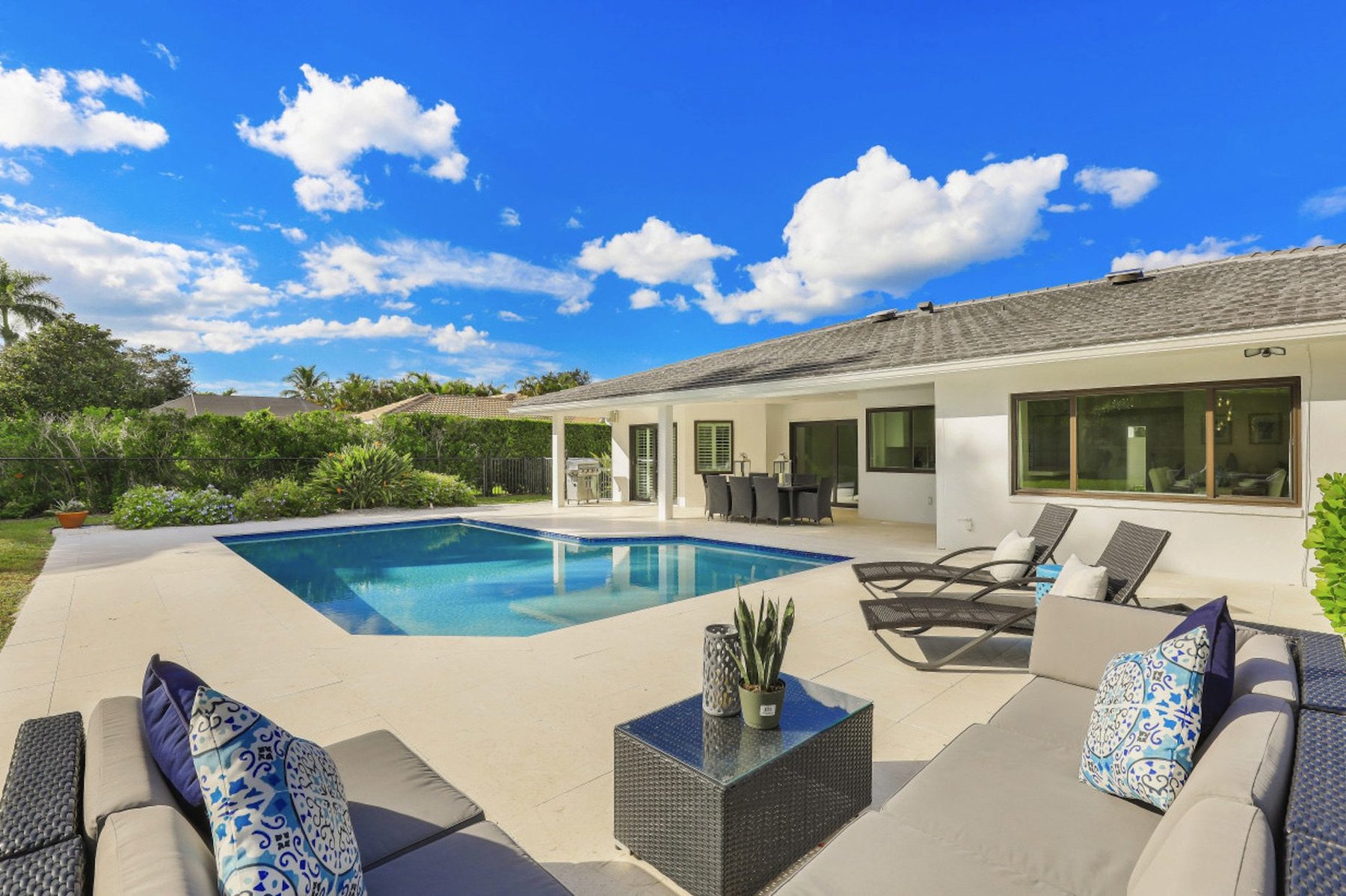 A renovated pool deck and lanai